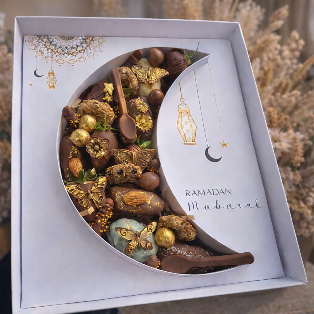 Ramadan Mubarak crescent moon chocolate gift box with gold-dusted truffles and butterfly decorations
